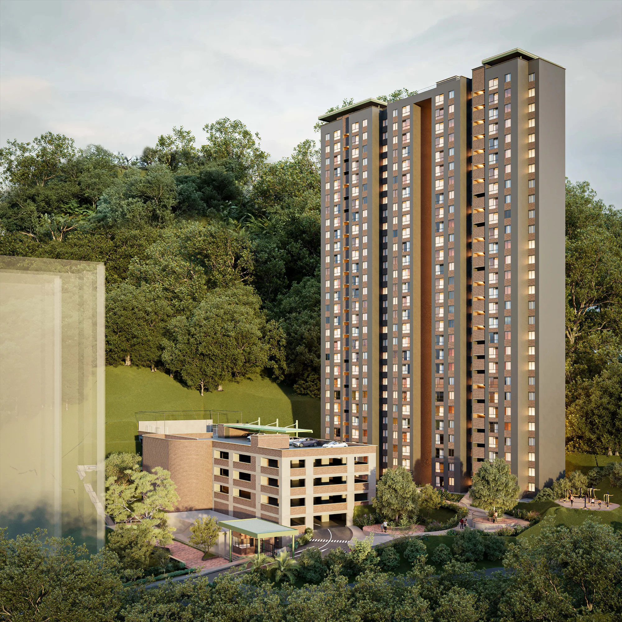 Vista aérea de una torre residencial y sus espacios verdes.